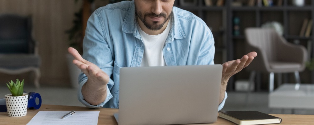 Man frustrated with computer